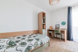 Espace nuit étudiant avec lit et rangements intégrés, design Structa.